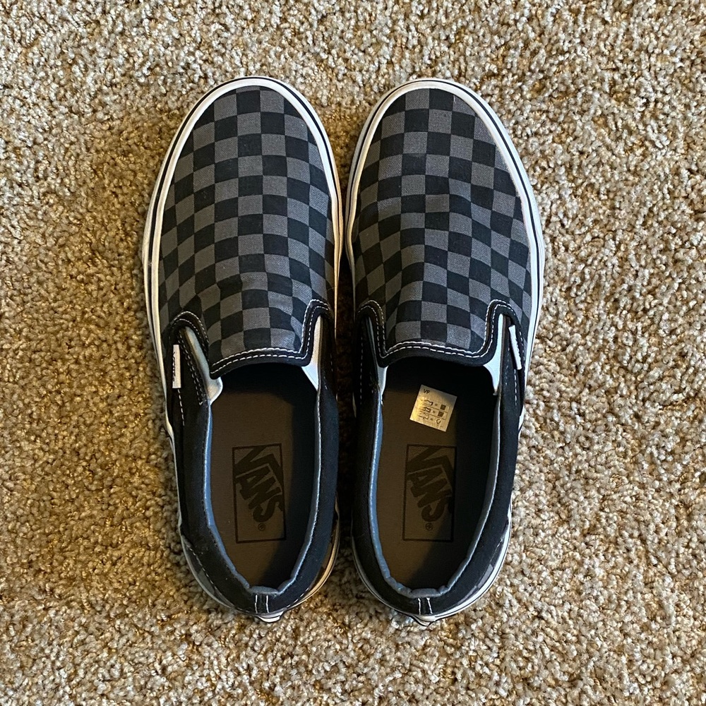 Checkered Vans slip ons